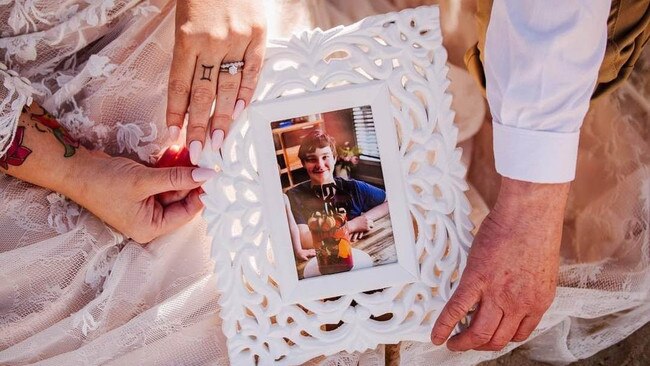 The couple had a picture of Zane at their elopement wedding.