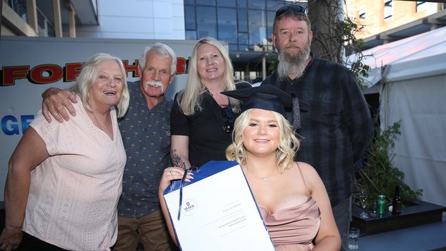 Jeanette and Gerry Tiehuis and Charmaine, Keith and Kyra Bryne celebrate graduation. Picture: Alan Barber