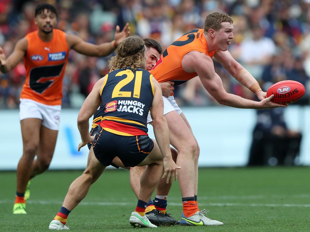 Tom Green’s work at the contest allows fellow Giants Josh Kelly, Stephen Coniglio and Lachie Whitfield to run attack. Picture: Sarah Reed/AFL Photos via Getty Images