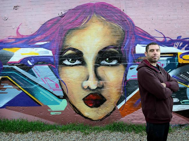 Street artist Adam Poole-Mottishaw has been nominated for a Pride of Australia award. Picture: Mark Brake