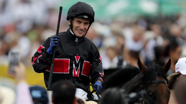 Luke Currie returns to scale after winning the Magic Million 2YO Classic with Away Game. Picture: Getty Images