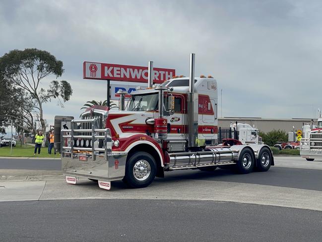 Dozens of prime movers formed a convoy in honour of veteran truckie Stuart Baker.