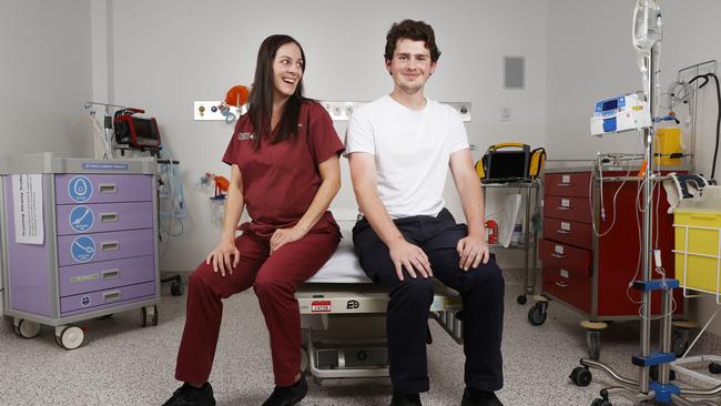 Harley Phipps with Chelsey Vladic clinical nurse consultant at the Royal Hobart Hospital. Harley Phipps 19 who spent an extended period of time at the Royal Hobart Hospital recovering from injuries sustained in a motorbike accident. Picture: Nikki Davis-Jones