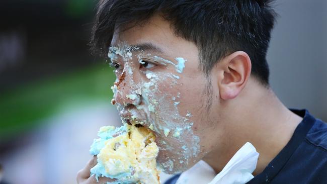 Winner of the cupcake eating competition Simon Nguyen at Bankstown Bites. PictureL Angelo Velardo