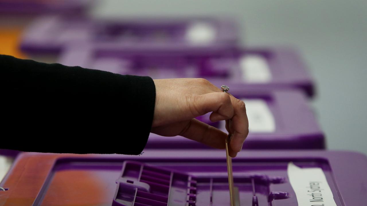 A member of the public casts an early vote at a polling centre in Sydney this week.