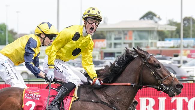 Without A Fight and Mark Zahra won the Caulfield Cup. Picture: Getty Images.