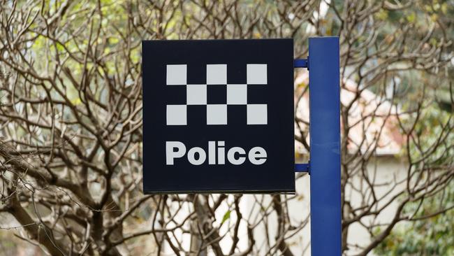 Woods bit an officer inside Byron Bay Police Station.