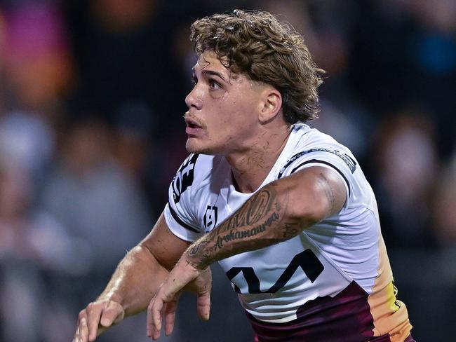 SYDNEY, AUSTRALIA - APRIL 27: Reece Walsh of the Broncos reacts after scoring a try during the round eight NRL match between Wests Tigers and Brisbane Broncos at Campbelltown Stadium, on April 27, 2024, in Sydney, Australia. (Photo by Izhar Khan/Getty Images)