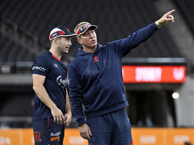 Sydney Roosters coach Trent Robinson (R) speaks with back Sam Walker during the captainÃs run at Allegiant Stadium on Friday, March 1, 2024, in Las Vegas. (Photo by David Becker)