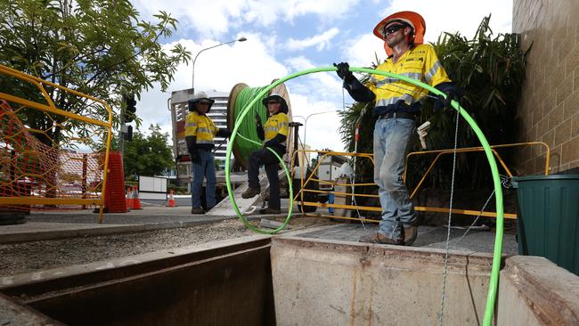 Linesman for NBN Co laying fibre optic cable in Cairns.