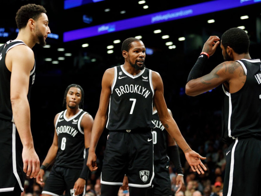 Brooklyn Nets forward Kessler Edwards reacts as his team takes on a 26  point deficit in the first quarter of an NBA basketball game against the  Boston Celtics, Tuesday, Feb. 8, 2022