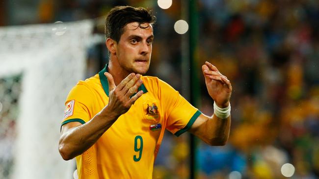 SYDNEY, AUSTRALIA - JANUARY 13: Tomi Juric of Australia reacts after missing an opportunity during the 2015 Asian Cup match between Oman and Australia at ANZ Stadium on January 13, 2015 in Sydney, Australia. (Photo by Daniel Munoz/Getty Images)