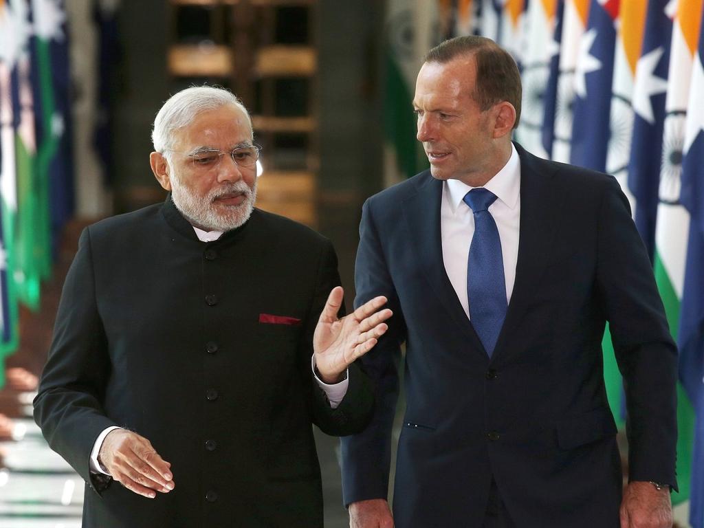 Former prime minister Tony Abbott with India’s Prime Minister Narendra Modi. Picture: AP Photo / Rick Rycroft