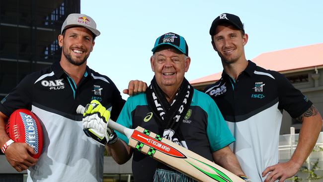 Port Adelaide players Travis Boak and Hamish Hartlett with cricket icon Barry 'Nugget' Rees Picture Simon Cross