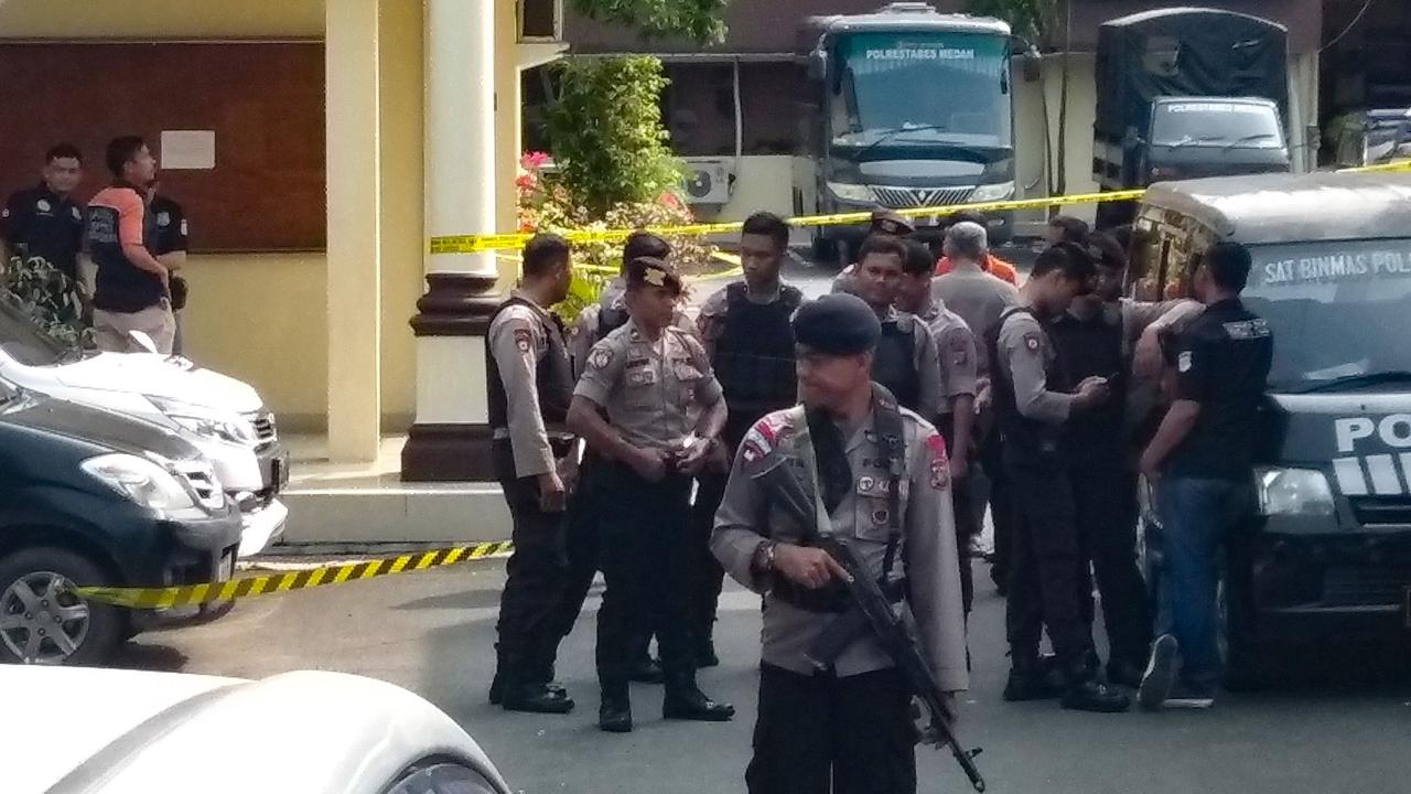 Indonesian police secure their headquarters in Medan, North Sumatra, after the attack. Picture: ATAR / AFP