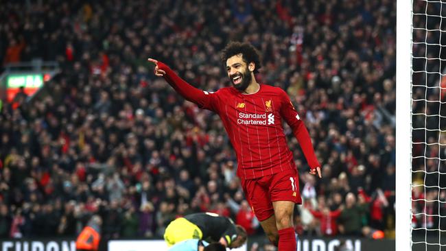 LIVERPOOL, ENGLAND - FEBRUARY 01: Mohamed Salah of Liverpool celebrates after scoring his team's fourth goal during the Premier League match between Liverpool FC and Southampton FC at Anfield on February 01, 2020 in Liverpool, United Kingdom. (Photo by Julian Finney/Getty Images) *** BESTPIX ***