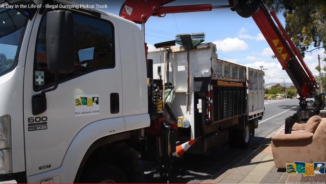 A council truck removes illegally dumped rubbish from the side of a road. Picture: Port Adelaide Enfield Council