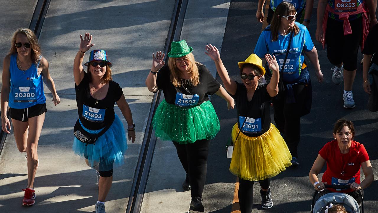 City to Bay participants walking in Adelaide, Sunday, Sept. 15, 2019. Picture: MATT LOXTON