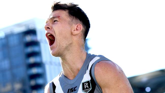 BRISBANE, AUSTRALIA - JULY 19: Robbie Gray of Port Adelaide celebrates kicking the match winning goal during the round 7 AFL match between the Carlton Blues and the Port Adelaide Power at The Gabba on July 19, 2020 in Brisbane, Australia. (Photo by Bradley Kanaris/Getty Images) *** BESTPIX ***