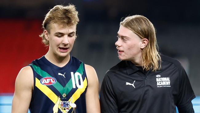 Ryley Sanders (left) grew up a Gold Coast Suns supporter despite having ties to North Melbourne. Picture: Getty Images