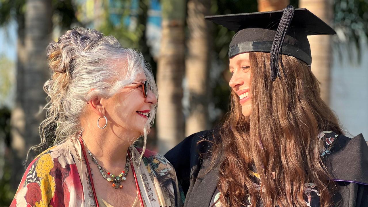 Valedictorian Hayley Cohen is joined by her mother Suzy Szlavik at the University of Southern Queensland graduation ceremony in Ipswich. Picture: Contributed