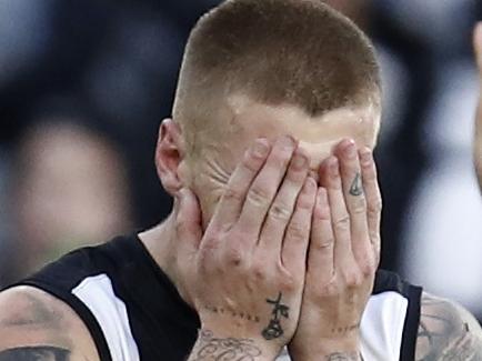 MELBOURNE, AUSTRALIA - JULY 04: Jordan De Goey of the Magpies reacts after missing a goal during the round 16 AFL match between Collingwood Magpies and St Kilda Saints at Melbourne Cricket Ground on July 04, 2021 in Melbourne, Australia. (Photo by Darrian Traynor/Getty Images)