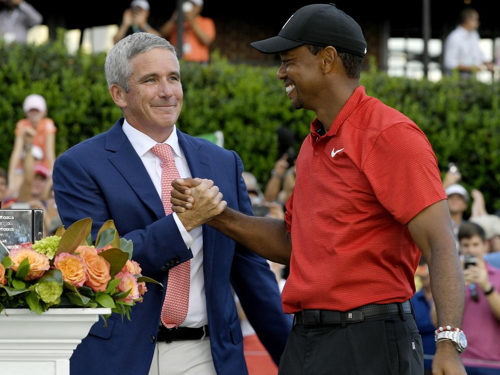 PGA Tour commissioner Jay Monahan with Tiger Woods. After denouncing LIV, Monahan has joined forces with the Saudi-backed golf enterprise. Picture: Stan Badz/PGA TOUR