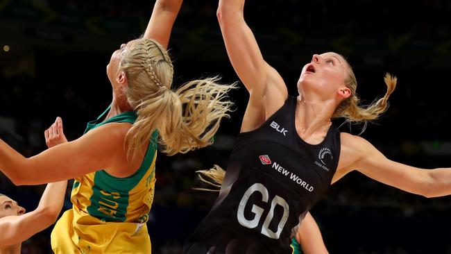 Diamonds Gretel Tippett and Silver Ferns Katrina Grant battle for possession during the Sydney game.