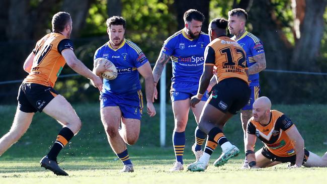 Jakob Giles charging up field. Picture: Sue Graham