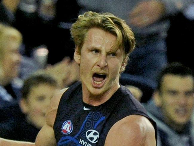 Daniel Gorringe of the Blues celebrates after kicking a goal, during the round 10 AFL match between Carlton Blues and the Geelong Cats, played at Etihad stadium in Melbourne, Sunday May 29, 2016.(AAP Image/Joe Castro) NO ARCHIVING, EDITORIAL USE ONLY