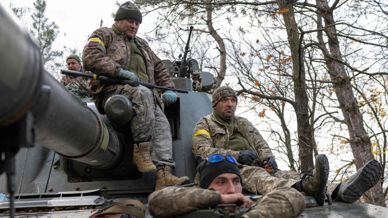 Ukrainian artillery unit members prepare to fire towards Kherson. Maj Gen Budanov said the city should by retaken by the end of next month. Picture: Bulent Kilic/AFP