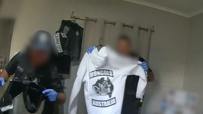 Police footage of a Mongols jumper found in a home during raids targeting alleged members and associates of the Mongols Outlaw Motorcycle Gang in Cairns.