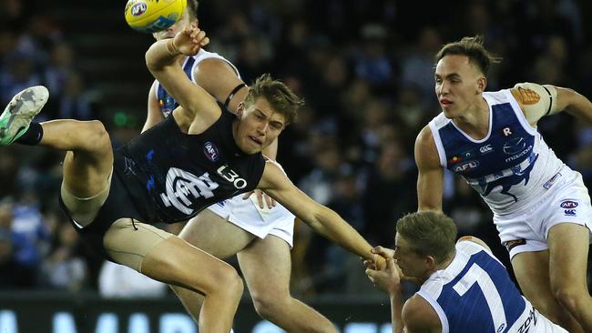 Carlton’s Patrick Cripps is thrown off the ball by Jack Ziebell. Picture: George Salpigtidis