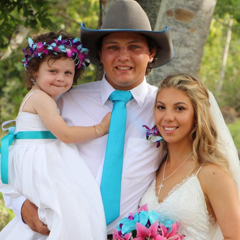 Rhiley and Maree Kuhrt on their wedding day with Rhiley’s daughter Bailey, who is now four years old. Picture: Facebook