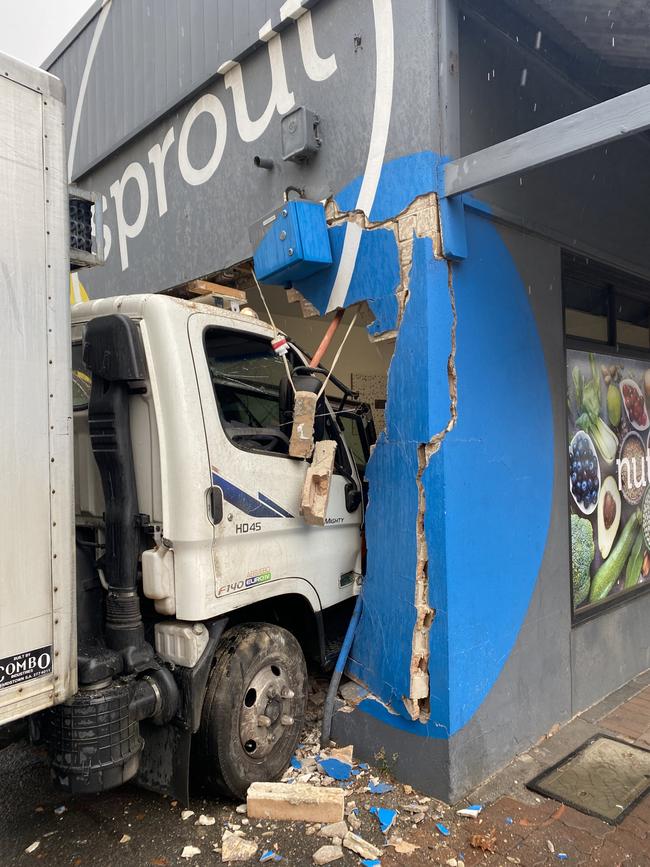 A truck hit a Stobie pole before crashing into the building. Picture Themis Chryssidis