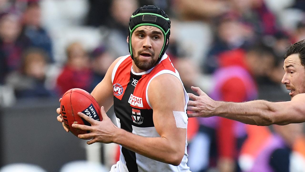 Paddy McCartin of the Saints (left) and Michael Hibberd of the Demons contest during the Round 15 AFL match between the Melbourne Demons and the St Kilda Saints at the MCG in Melbourne, Sunday, July 1, 2018. (AAP Image/Julian Smith) NO ARCHIVING, EDITORIAL USE ONLY