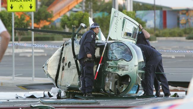 The wreckage of the helicopter at the scene.