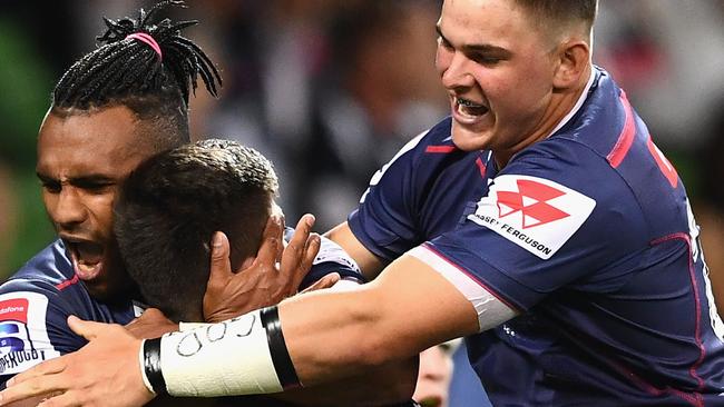 MELBOURNE, AUSTRALIA - MARCH 09:  Jack Maddocks of the Rebels is congratulated by team mates after scoring a try during the round four Super Rugby match between the Rebels and the Brumbies at AAMI Park on March 9, 2018 in Melbourne, Australia.  (Photo by Quinn Rooney/Getty Images)