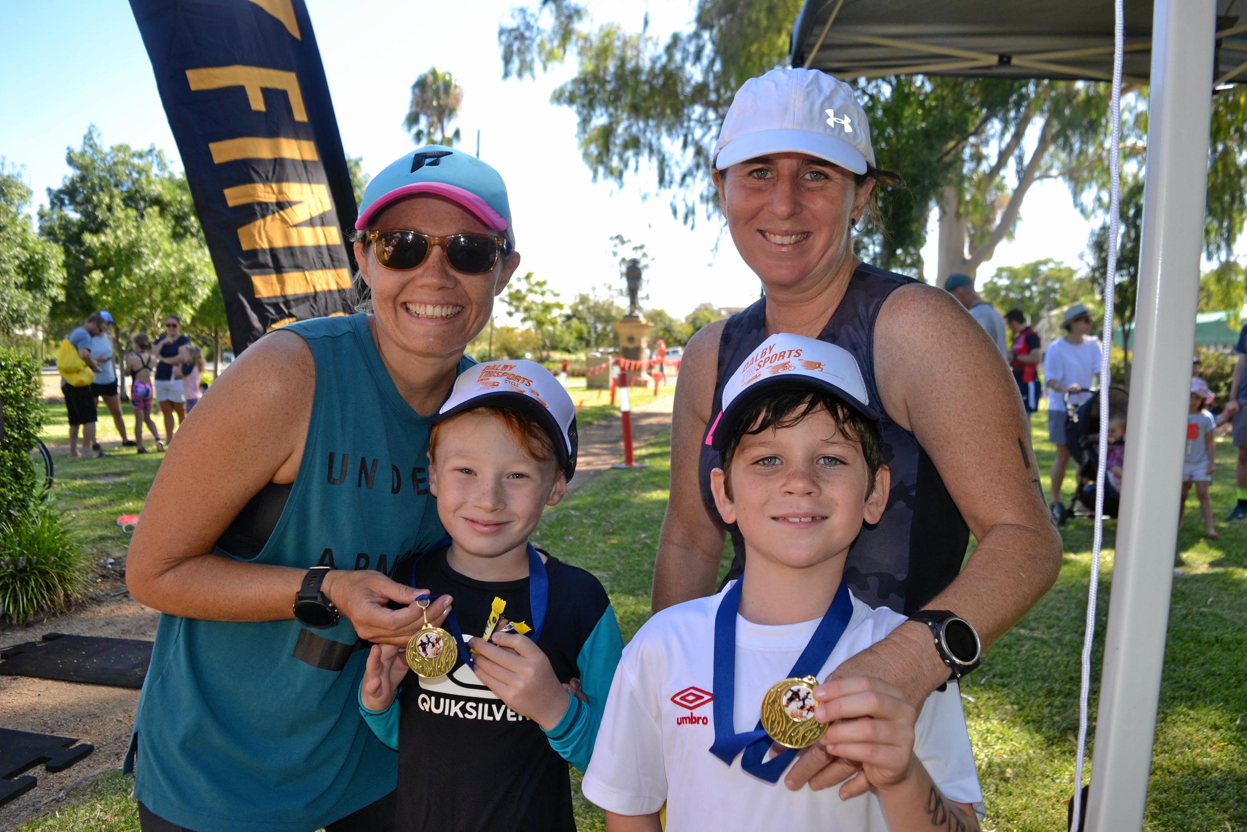 Megan and Archer Braunberger along with Amber and Hugh Baker travelled from Wandoan for the triathlon. Picture: Meg Gannon