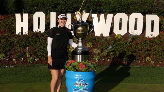 Hannah Green poses with the trophy after winning the JM Eagle LA Championship, one of her three LPGA wins in 2024. Harry How/Getty Images/AFP (