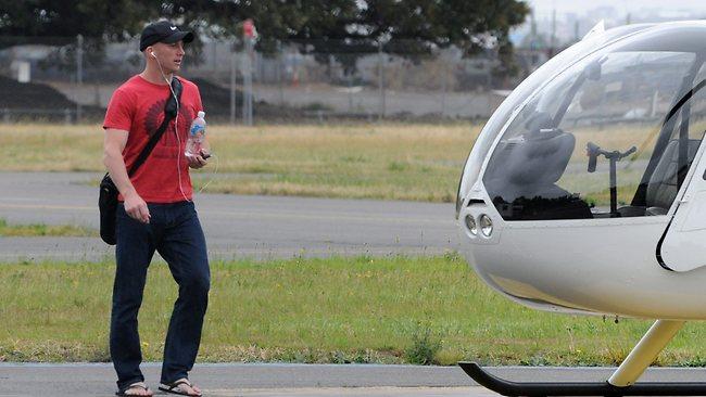 Brisbane Broncos captain Darren Lockyer aboard a helicopter