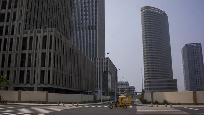 Unfinished buildings and vacant streets pictured in Xiangluo Bay. Picture: Zhang Peng/LightRocket via Getty Images