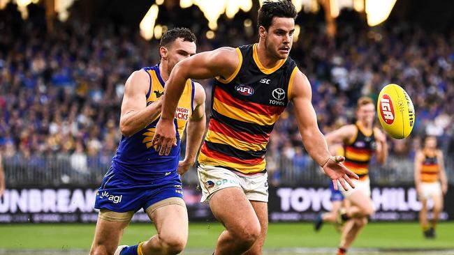 Darcy Fogarty of the Crows chases down a loose ball in his breakout game against West Coast. Picture: Daniel Carson/AFL Photos via Getty Images