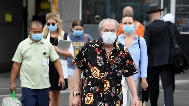 Passengers wear face masks at Central Station in Sydney. Picture: Joel Carrett