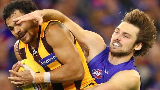 Joel Hamling takes on Cyril Rioli in a marking contest last week. Picture: Getty Images.