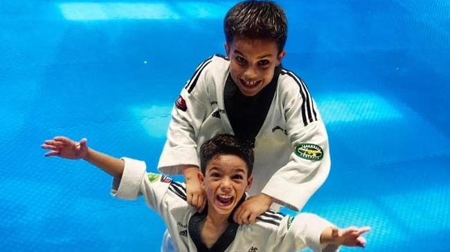 Matt Caserta (top) and his late twin brother, jockey Chris Caserta, as kids doing martial arts. Picture: Supplied by Matt Caserta