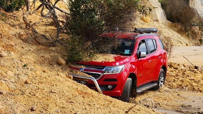 Epic Ocean Adventures Noosa owner Tyron Van Santen says the owners of a car swallowed by a spectacular sand slip at Rainbow Beach wereÂ â&#128;&#152;luckyâ&#128;&#153; to escape without injury. Pictures: Epic Ocean Adventures Noosa