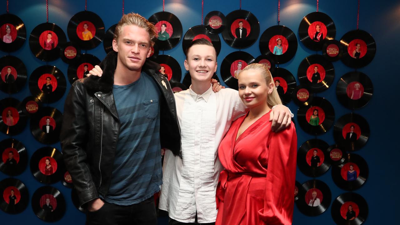 Cody Simpson with brother Tim and sister Alli at All Saints College. Picture: Jason O'Brien