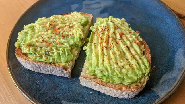 Australians are winding back their spending on smashed avocado.