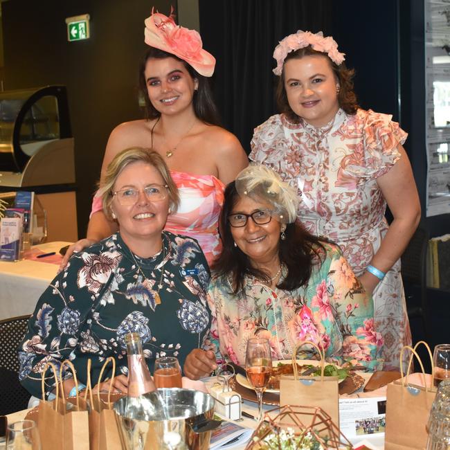 Tiffany Hutchinson, Alysia North, Roxanne Hodda and Joshna Govender from BreastScreen Rockhampton at the Rockhampton Jockey Club's Pink Ribbon Stradbroke Charity Race Day at Callaghan Park on June 15, 2024.